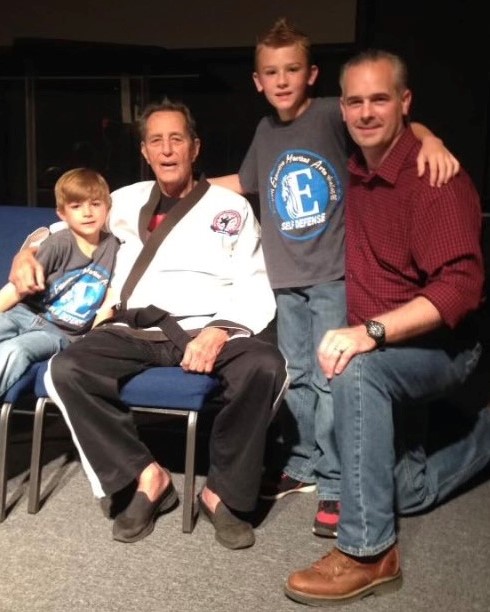 "Father of Karate Championships" Grand Master Pat Burleson with Pheyland Barthen and kids